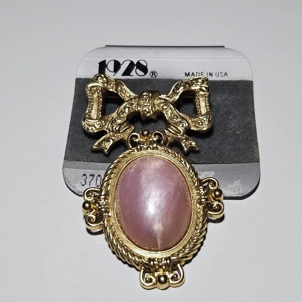 *Sale* 1928 Gold Tone Bow With Dangling Pink Faux Stone Brooch